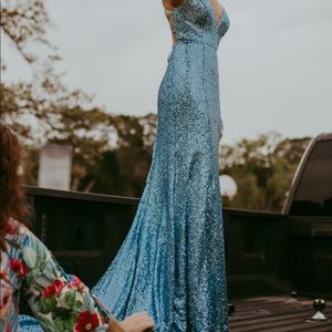 Blue sequin Prom dress. Worn once then put back into the bag. It’s a size 0